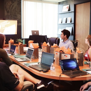 Nova Studios — web design team working on laptops